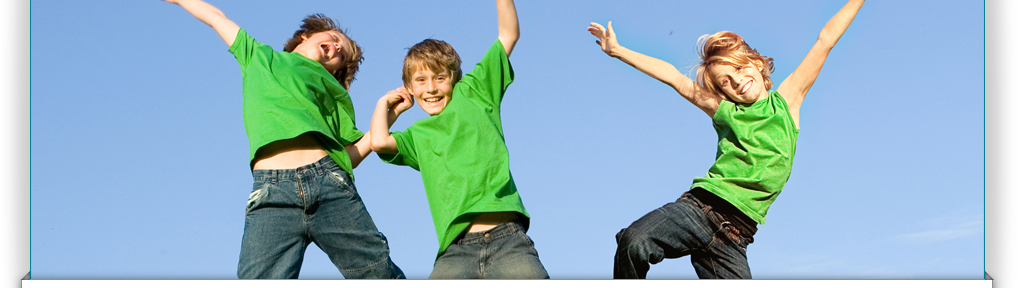 Kids jumping around and smiling